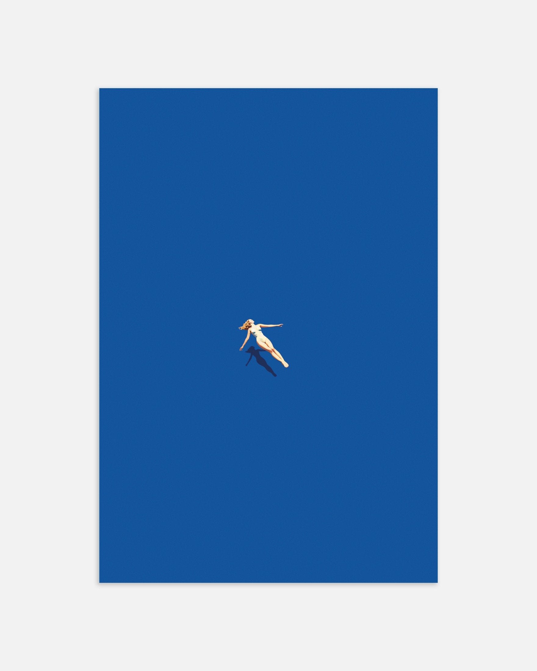 Surreal artwork of a nude figure lying on a blue background