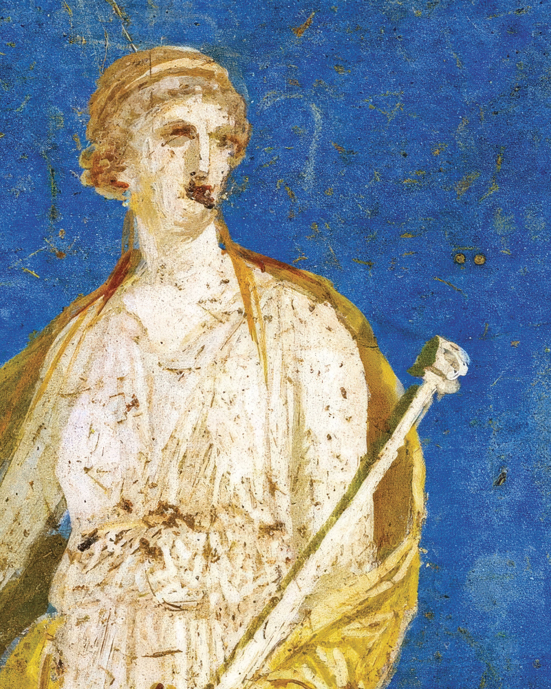 A close-up of a painted figure in classical dress holding a staff, rendered in warm beige and gold tones against a vivid blue background.